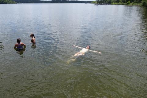 Back float in the lake. 
