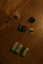 Parts for one charger: regulator and batteries.